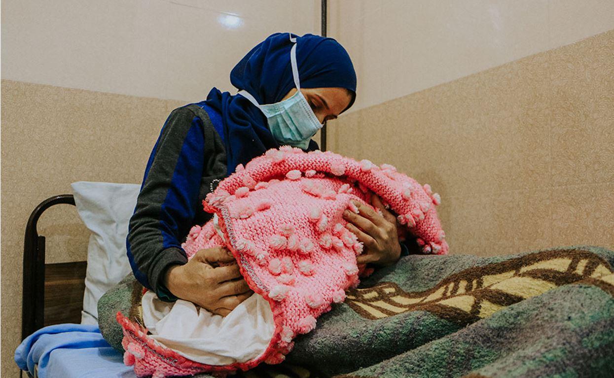 A displaced woman who gave birth to her fourth child at a hospital co-managed by MSF, the main hospital providing C-sections in the area. 