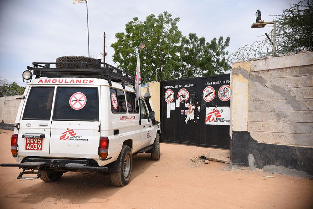 An MSF ambulance seen outside MSF compound gate in Dagahaley .