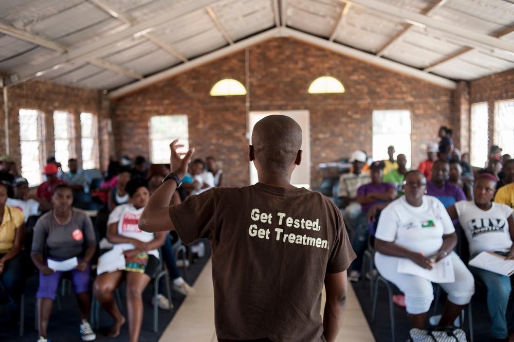 A Stop Stock Outs Project (SSP) activist addresses people at an activist meeting in Soshanguve, a township outside of Pretoria on April 16, 2015.