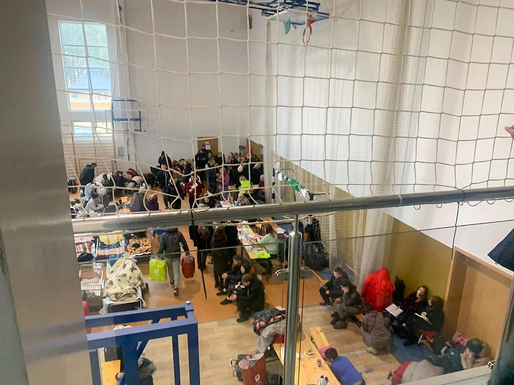 View of reception center at crossing point in the town of Hrebenne, Poland, which lies on the border between Lublin (Poland) and Lviv (Ukraine). The head of the United Nations refugee agency says more than a half a million people had fled Ukraine since the conflict started.