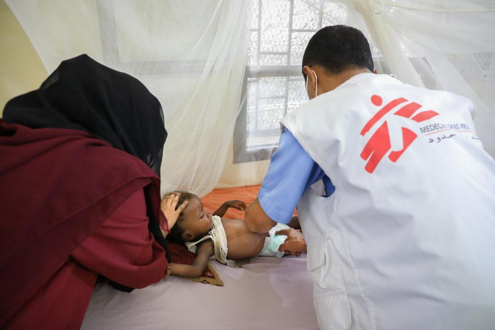 MSF, Doctors without borders, Dr Aref checking on  1 and a half year old
