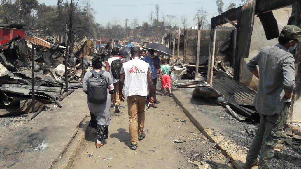 A picture of MSF assessment team outside the burnt camp in Cox's Bazaar in Bangladesh