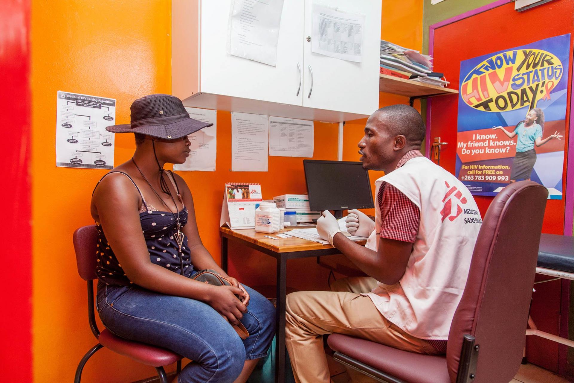 An 18-year-old woman receives the results of her HIV test.