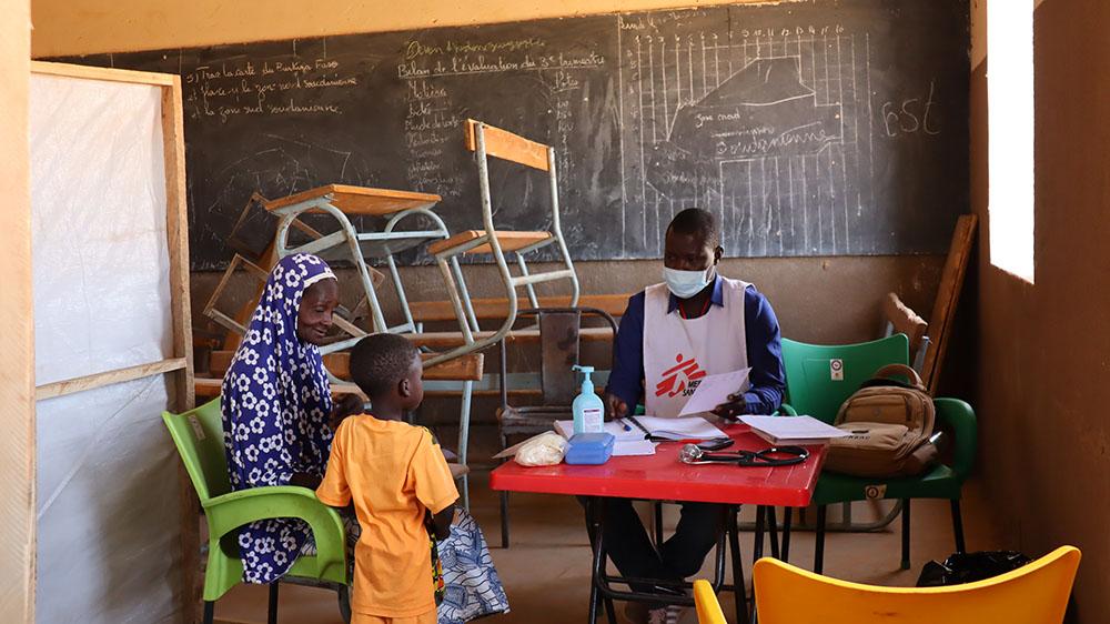 A child is undergoes a check up by MSF medical staff as part of a mobile clinic in in Titao, North Region, Burkina Faso. 