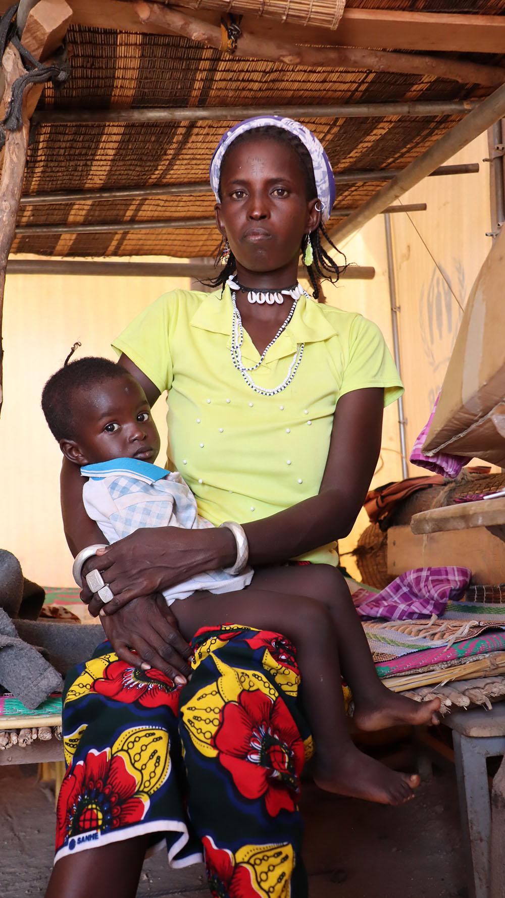 Salamata, has been living for more than two years with her husband, children and nearly 2,000 other people in the camp at the edge of the town of Barsalogho, north central region, Burkina Faso. 