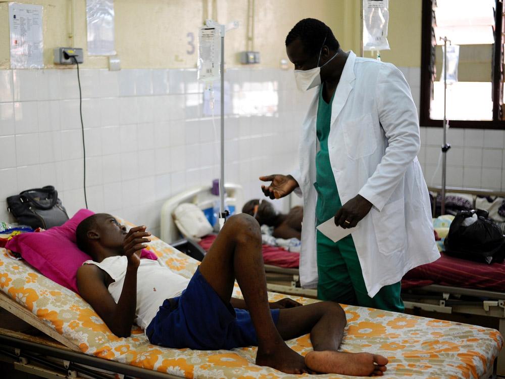 A doctor checking on an Advanced HIV patient in Bangui
