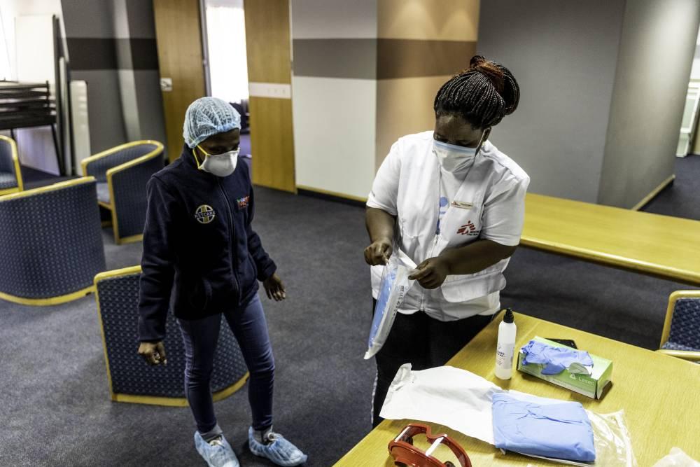 Bhelekazi Mdlalose, an MSF field worker who is working as a contact tracer carry’s out training with a nurse at a mass COVID-19 screening and testing event in Johannesburg, South Africa. 