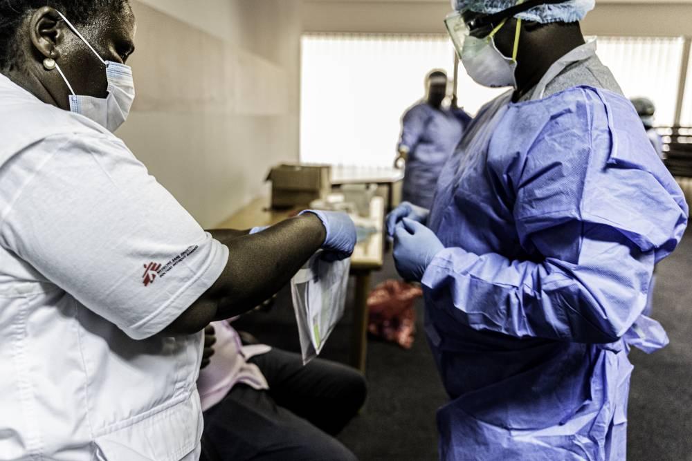 During a mass screening and testing MSF contact tracer Bhelekazi Mdlalose places a test swab in a bag which is sent to South Africa’s National Laboratory Services to be tested for COVID-19.