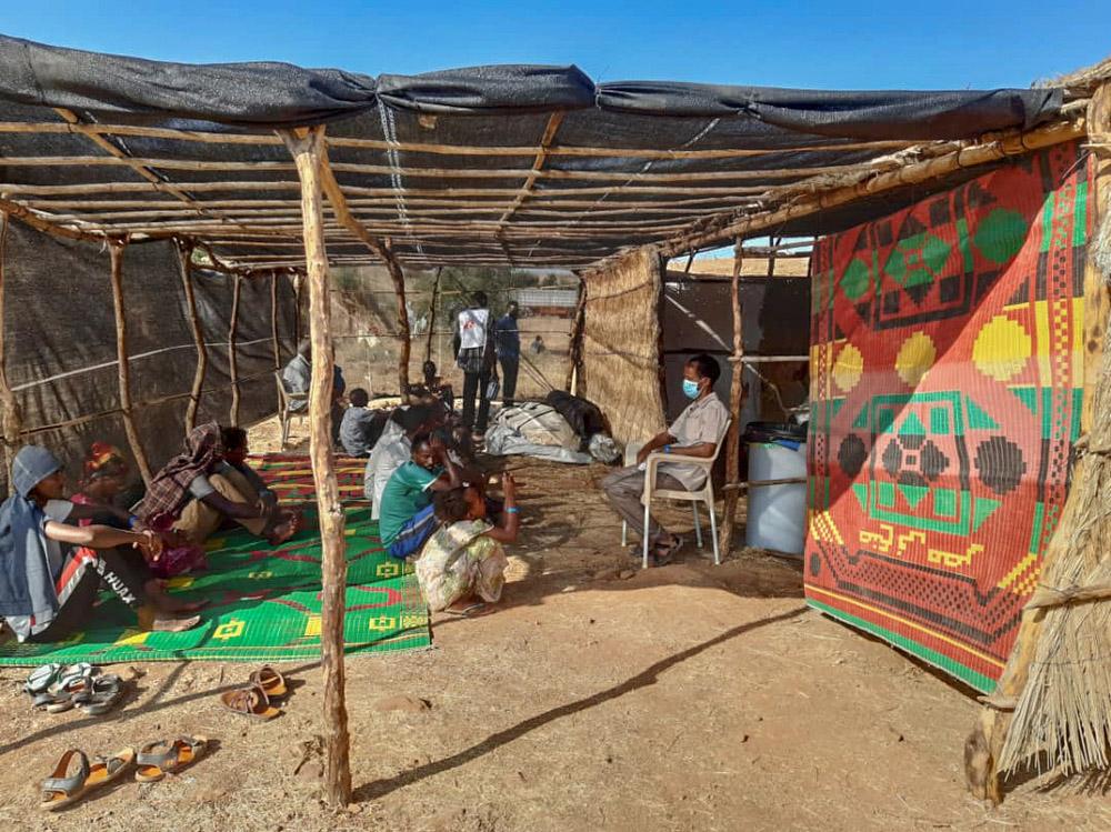 A picture of Ethiopian Refugees Crossing at Um Rakuba camp where refugees are screened for COVID-19 symptoms, 19 November 2020