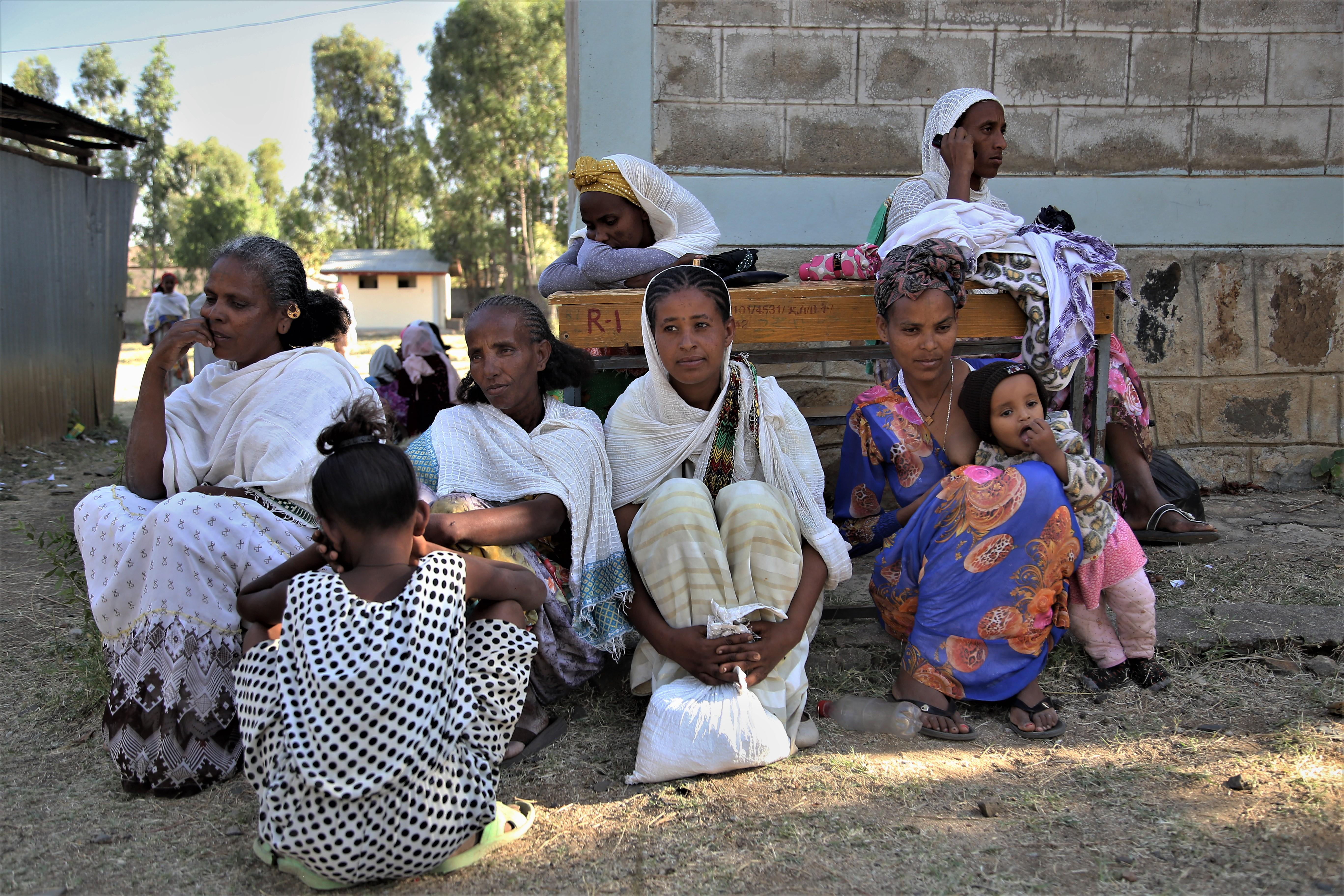 A picture of displaced women passing the time at Kundeya school, in the city of Axum, where they have taken refuge from the conflict in the northern Ethiopian region of Tigray.