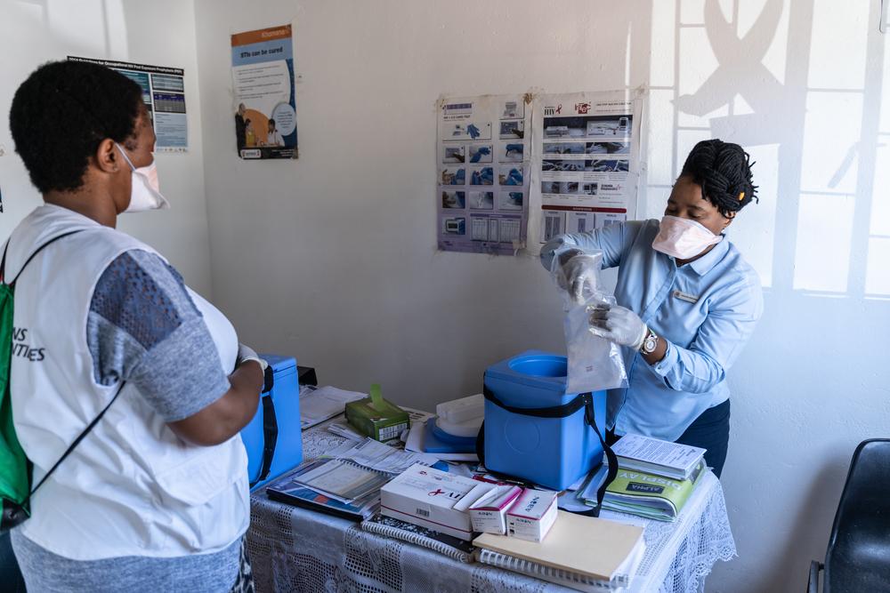 Nobuhle Titus, an MSF nurse technical support, packs sputum samples collected from a Luyanda site in the town of Vuma in Eshowe