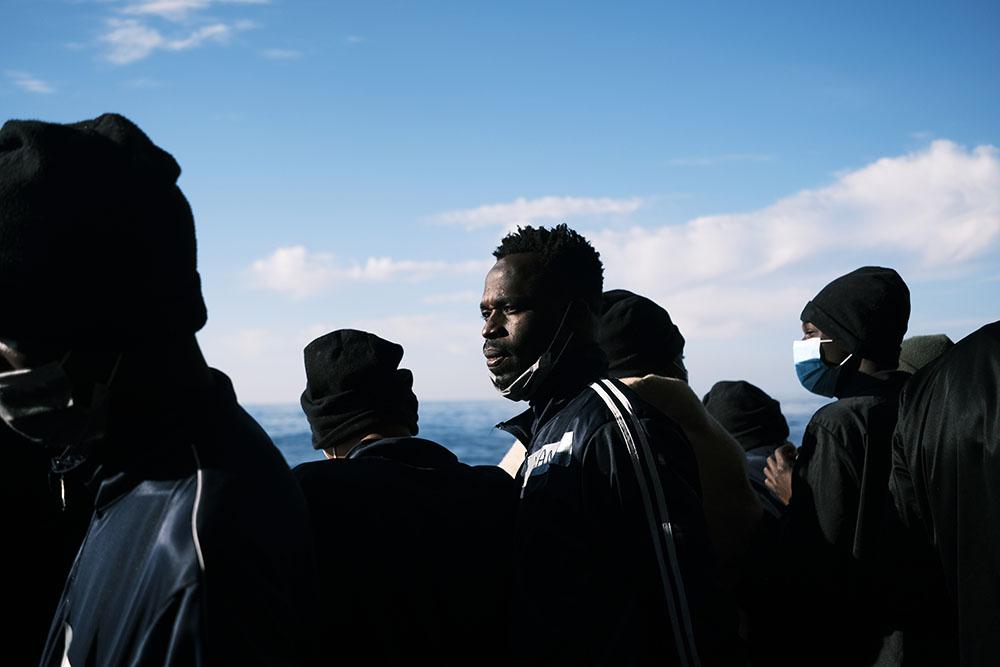 Jeans stairs out at the sea on board the Geo Barents. The rescue ship operated by MSF, continues patrolling the search and rescue area for more boats in distress. Rotation 8. Central Mediterranean Sea 