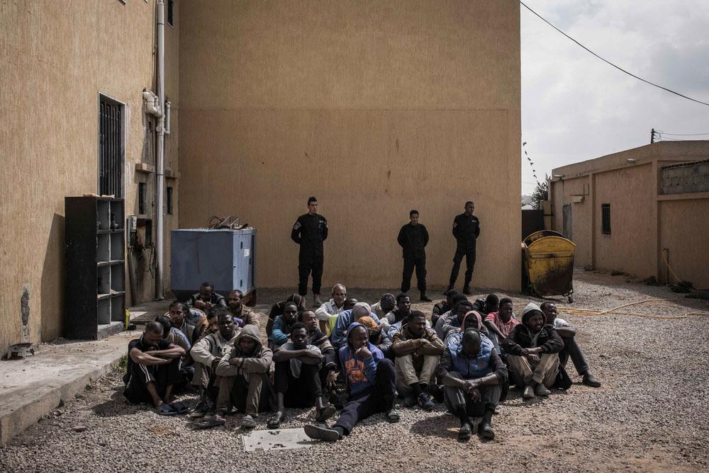 Men detained in Janzour detention centre, in the outskirts of Tripoli, Libya. Detainees spend days and months in Libyan detention centres, without knowing when they will be released. 