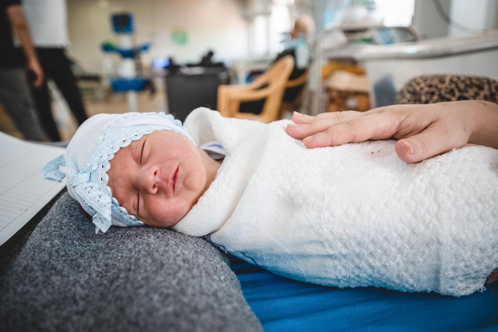 Baby sleeping at Nablus hospital, West Mosul