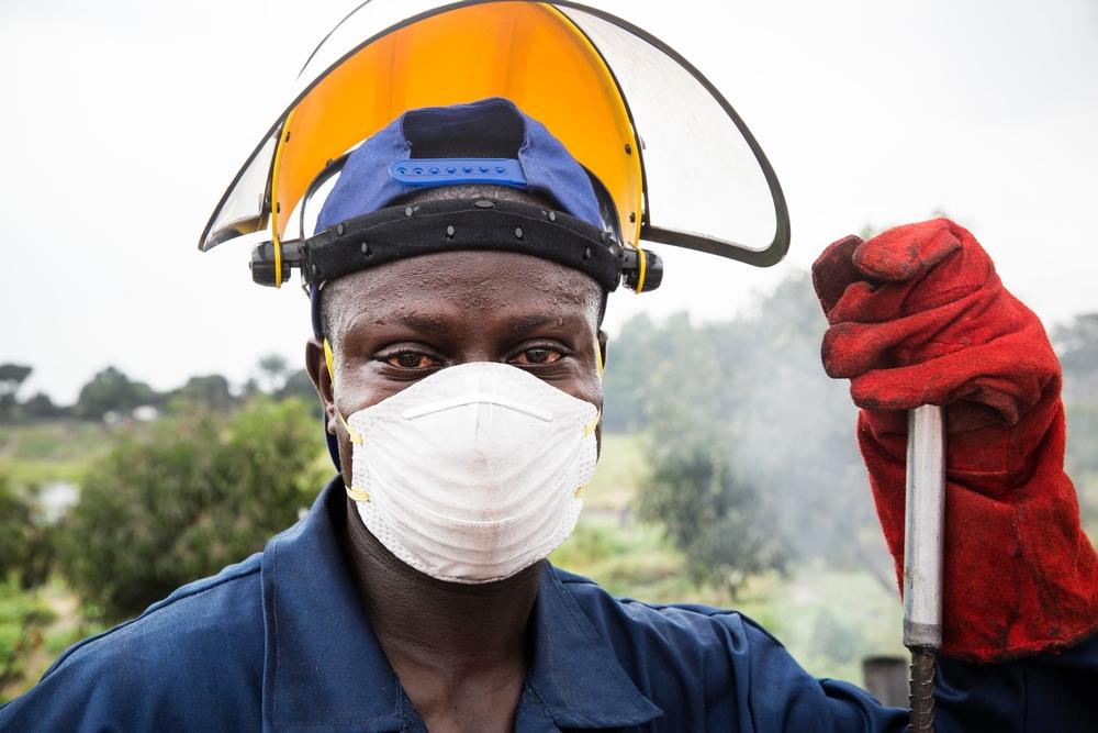 Hervé Tembe Luzitu is responsible for the waste management of different vaccination sites. Used needles are brought to him daily. Hervé works 8am on. The work is very tiring because the heat is hard to bear.