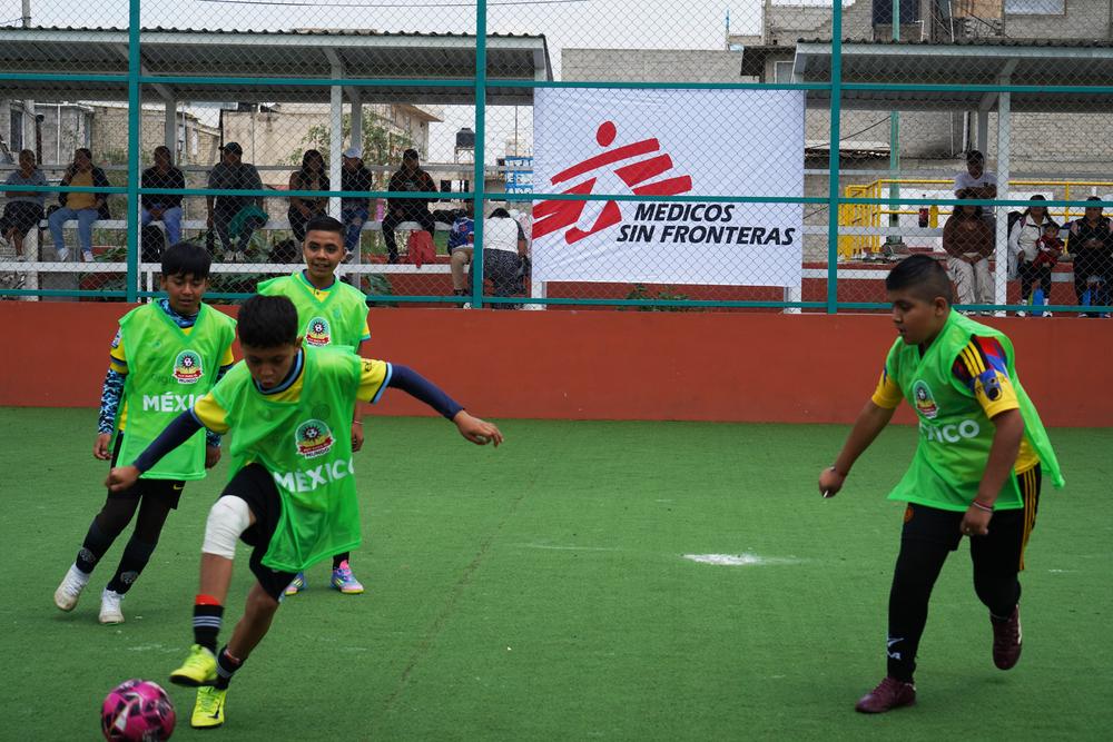 Children are playing before the official start of the tournament, at the world cup hosted at Chalco
