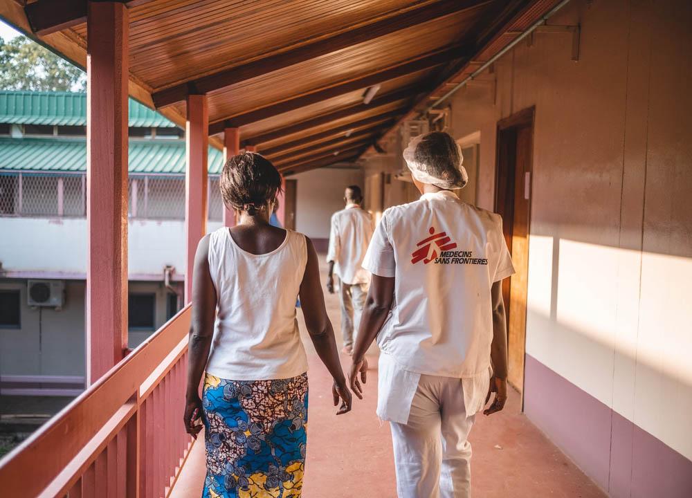 MSF nurse Virginie Abdouramane (right), is walking with a patient at the MSF-supported maternity of the Community Hospital Centre (CHUC), Bangui, Central African Republic