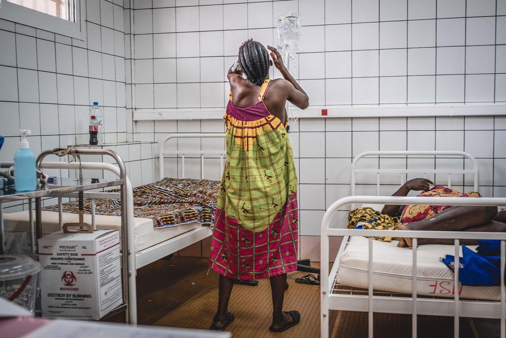A patient waiting for her first child has been in pain for hours at the MSF-supported maternity ward specialised in complex pregnancies and deliveries, Community Hospital Centre (CHUC), Bangui, Central African Republic