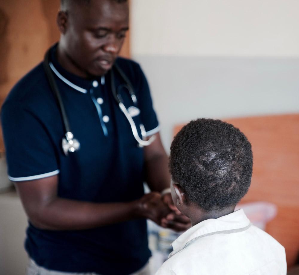 MSF_Healthcare_Worker_Checking_HIV_Patient_In_Chiradzulu
