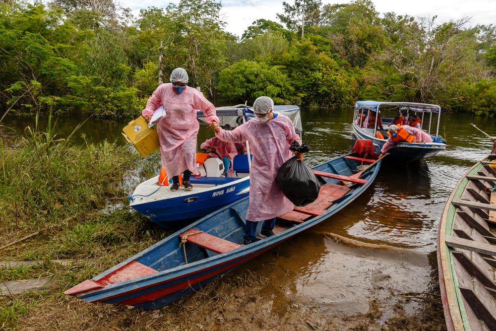 MSF staff arriving at a community at lake Mirini in Brazil
