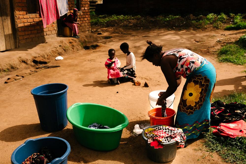 A picture of a woman washing clothes in Malawi