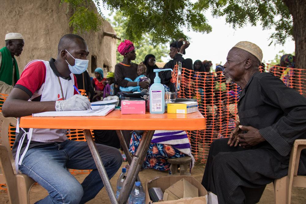 A picture of an elderly man receiving a consultation at MSF’s medical facility in central Mali, where people fled in search of refuge because of deadly attacks on villages.