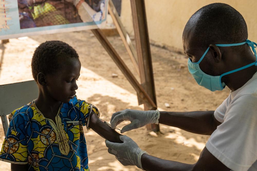 Child getting vaccinated in Mali by our MSF staff