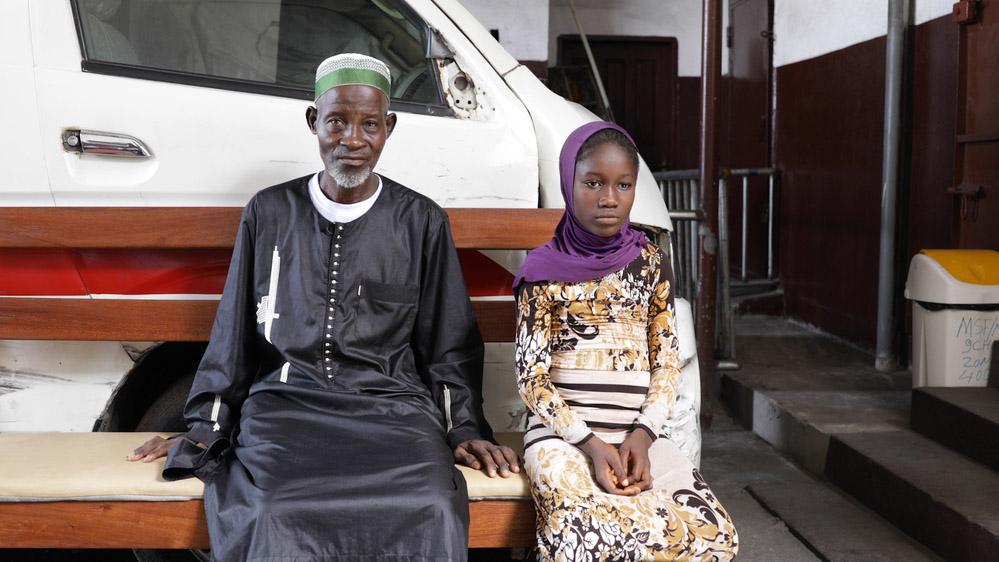 Abraham brought his 10-year-old daughter Sidie to the clinic in the West Point township of Monrovia, Liberia, for an epilepsy consultation through the MSF program