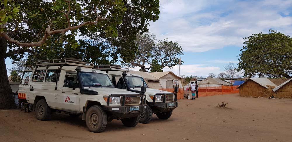 A picture of MSF cars outside the 25 de Junho Camp in Cabo Delgado