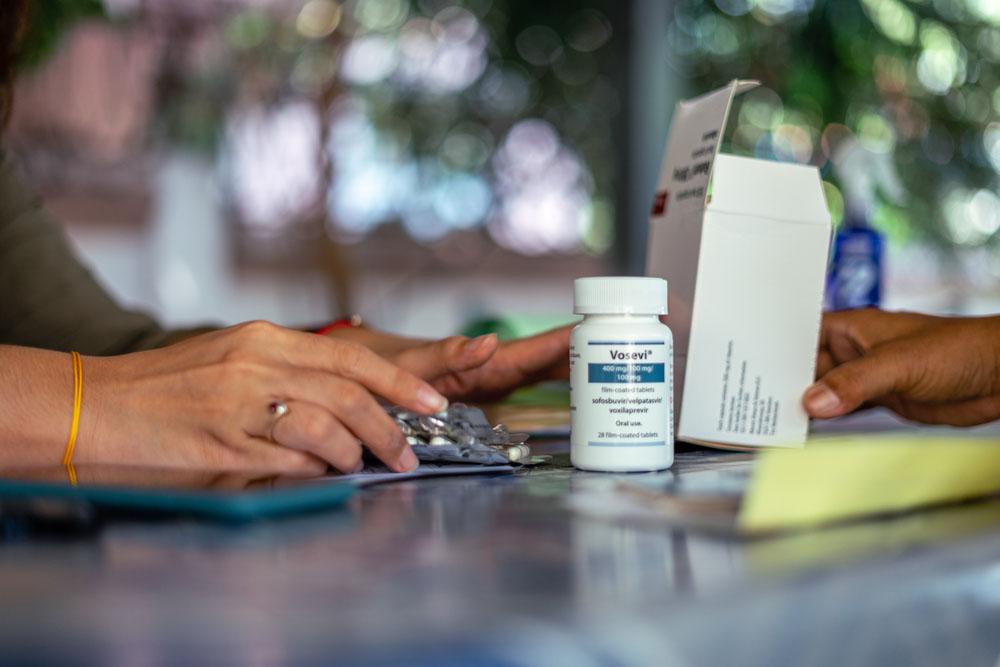 MSF staff member consulting a patient in Myanmar