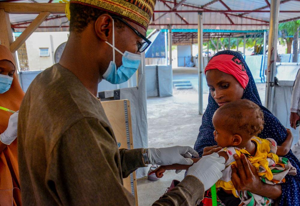 MSF DOCTOR NASIRU, ASMAU RABIU AND CHILD 