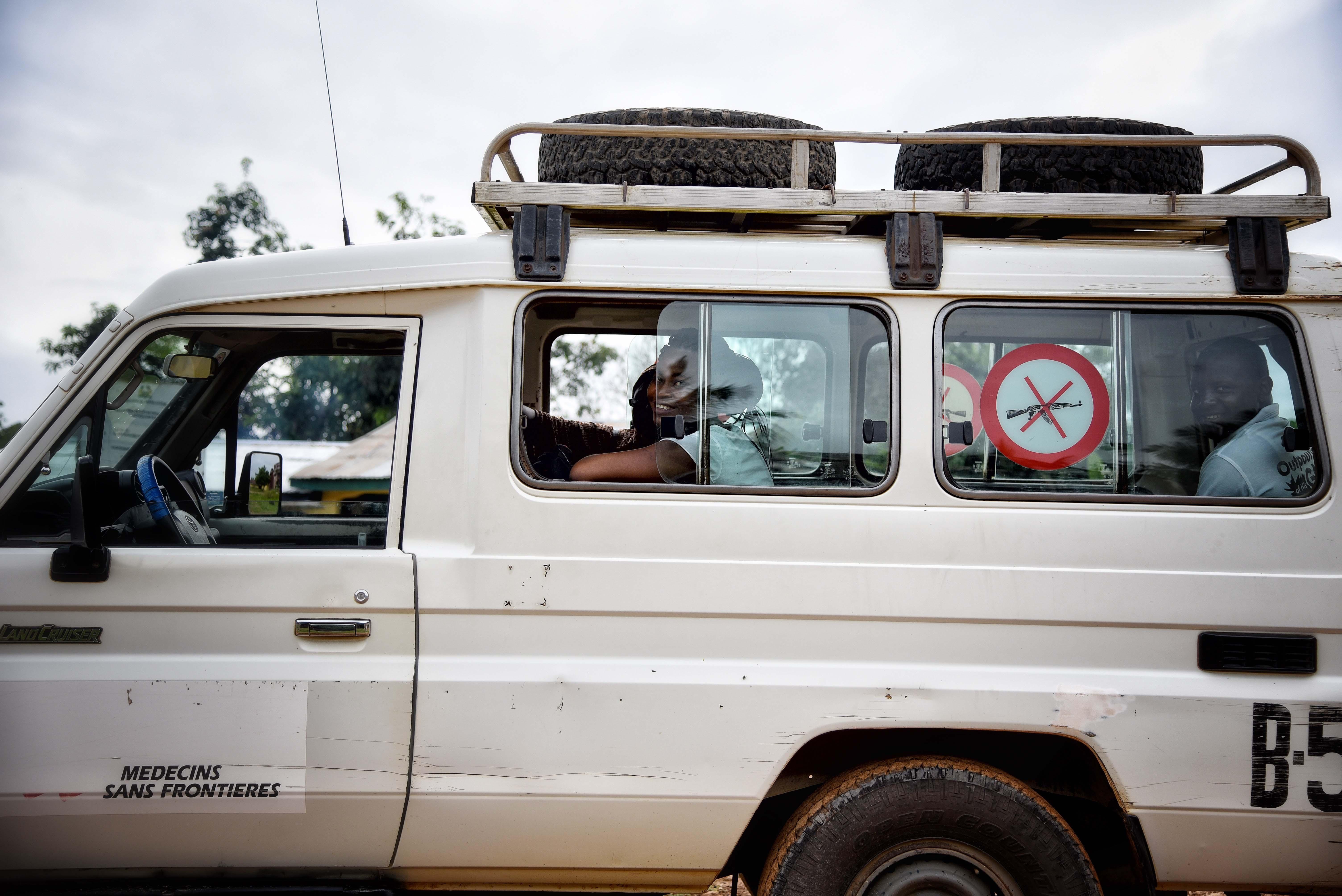 The MSF outreach team in an MSF vehicle in Kenema, Sierra Leone
