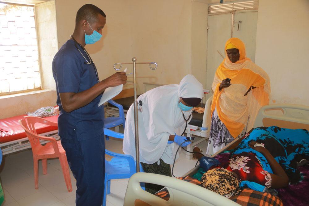 Medical staff check a patient’s blood pressure in the maternity ward at Galkayo South hospital, in Galmudug state, central Somalia.
