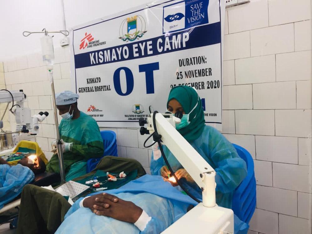 A picture of a female surgeon conducting cataract surgery.