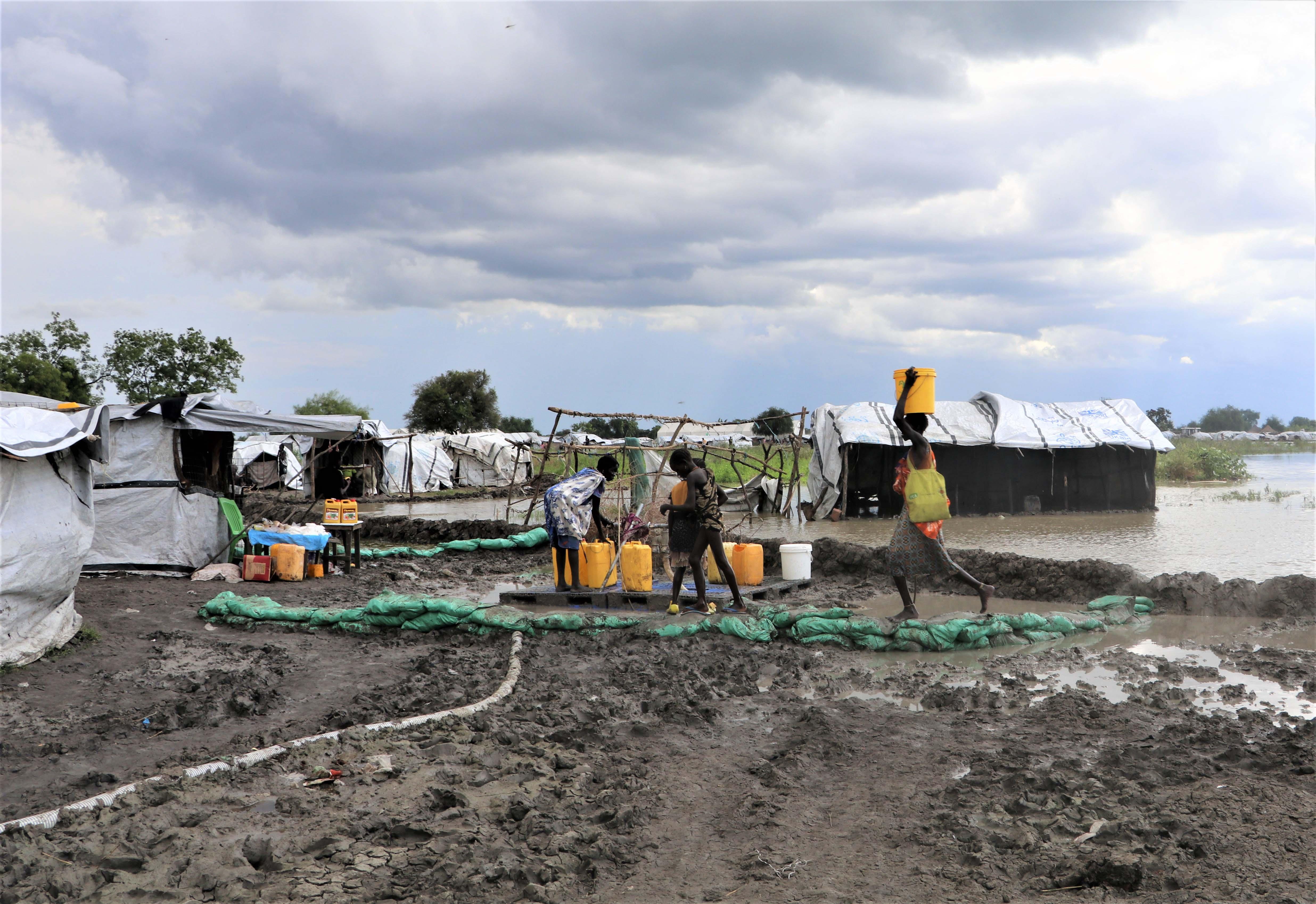 People collect water from MSF’s surface water treatment center in Pibor town, the Greater Pibor Administrative Area, South Sudan.