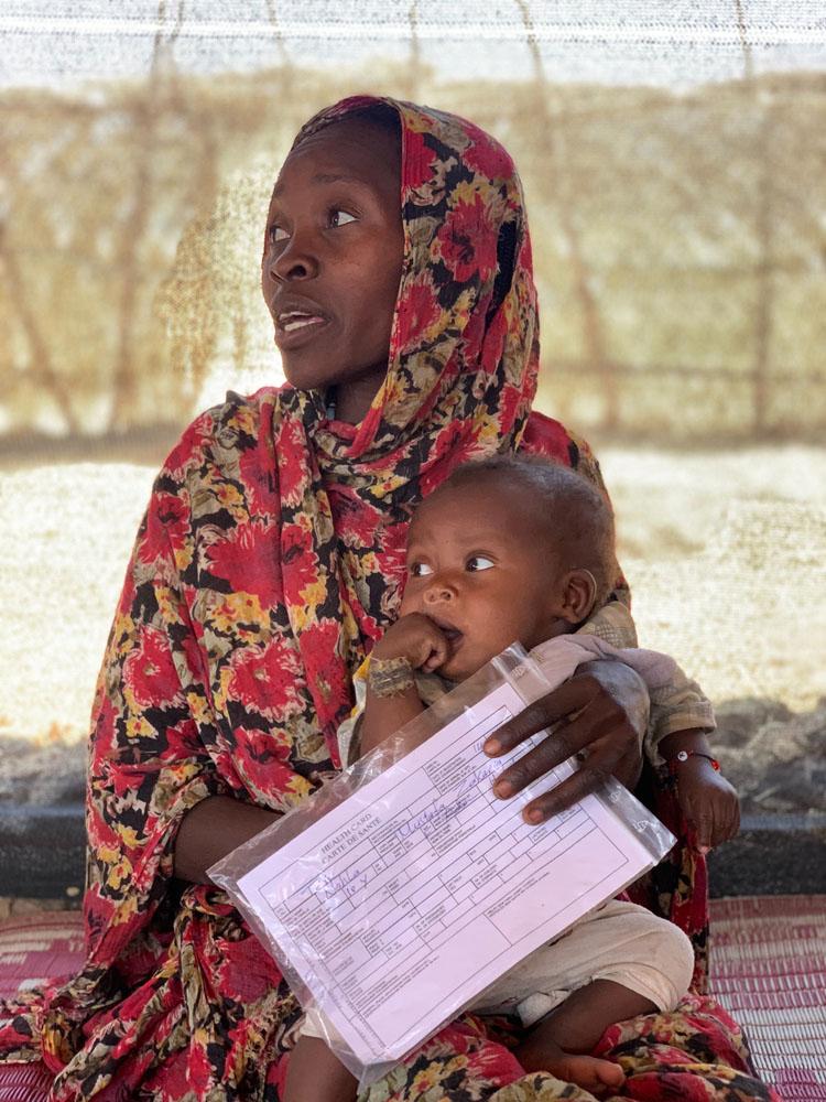 Mabola and her 8 month old son Ahmad who suffer from hear infection waiting to be treated at MSF clinic in Dilli village, Jebel Marra mountains, Darfur Region. Sudan