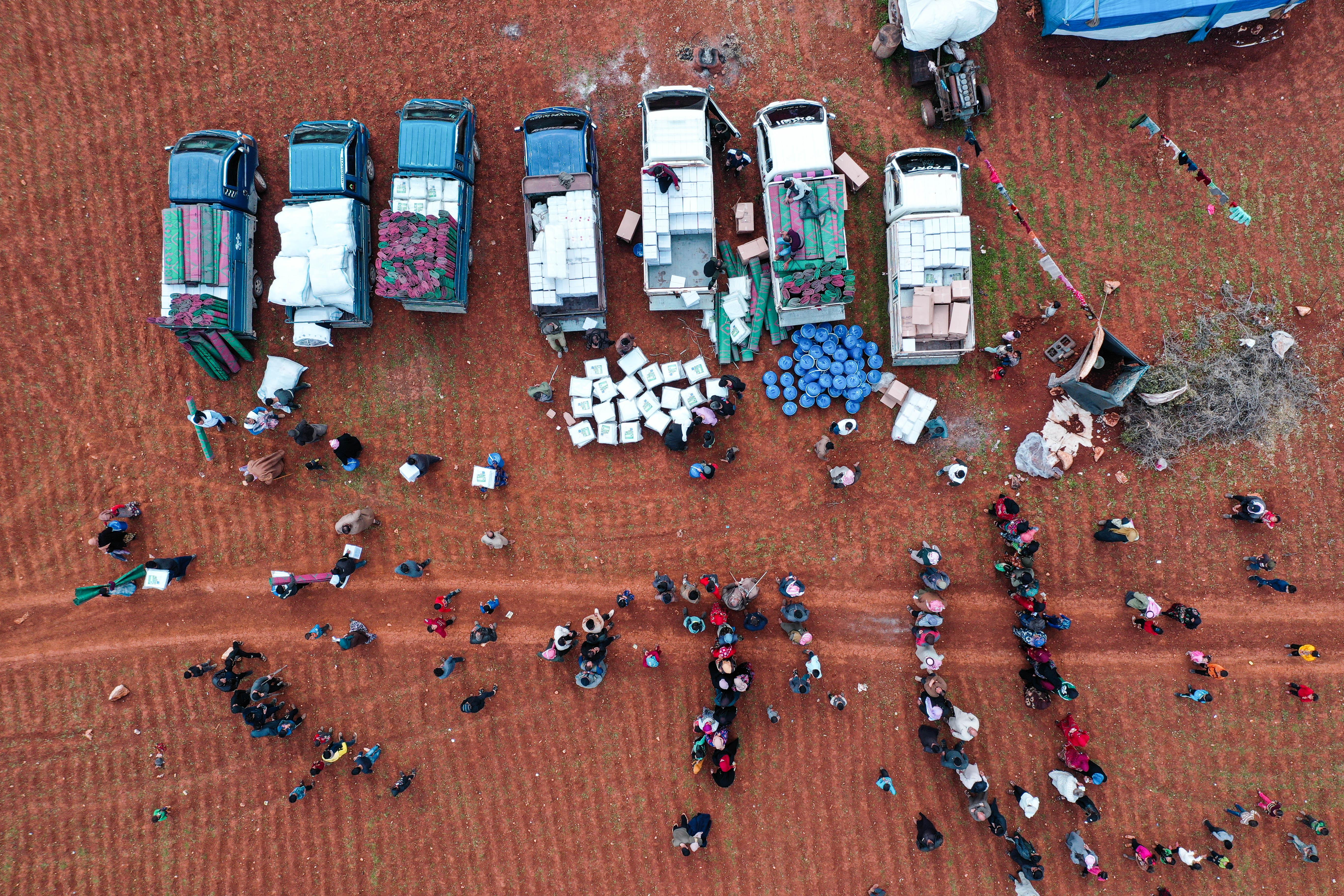 MSF distributing hygiene kits, installing latrines and providing potable water to the people in camps.