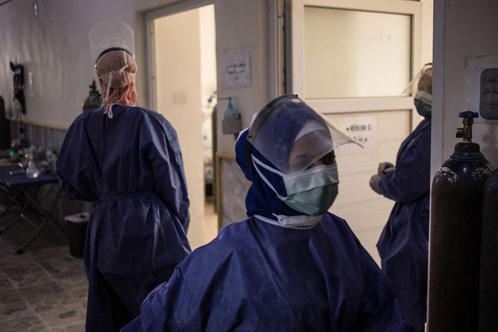 Nurses are busy in the corridors of the COVID-19 section of Raqqa National Hospital, in northeast Syria.