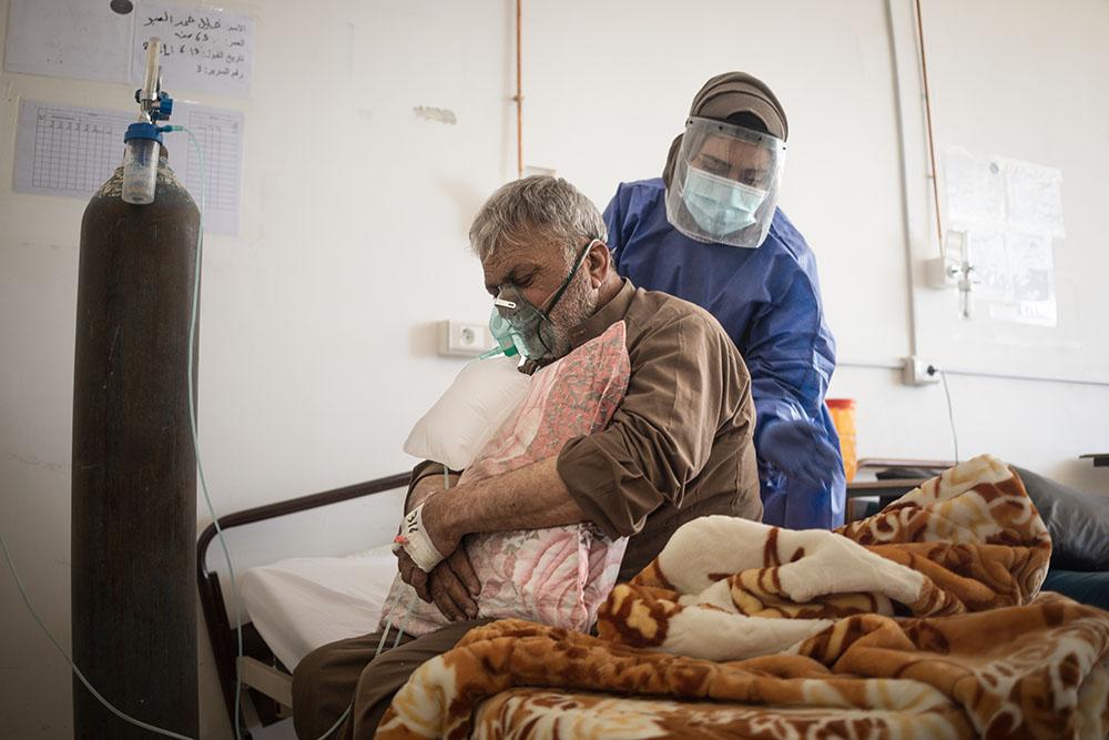 A patient receives care in the COVID-19 ward of Raqqa National Hospital, in northeast Syria. MSF has now moved it's COVID-19 response from Raqqa National Hospital to Raqqa Covid-19 centre.