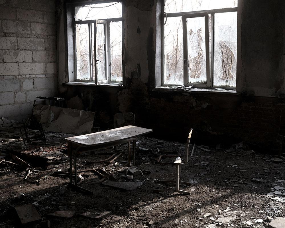 UKRAINE. Pisky. 22 February 2022. A school destroyed during the fighting. MSF has been working in eastern Ukraine for the last eight years, trying to improve access to health care for remote, conflict-affected populations.