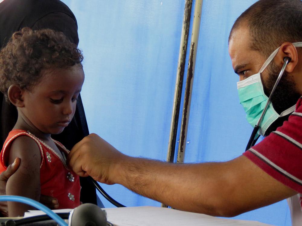 A child getting checked for malnutrition at Abs Hospital