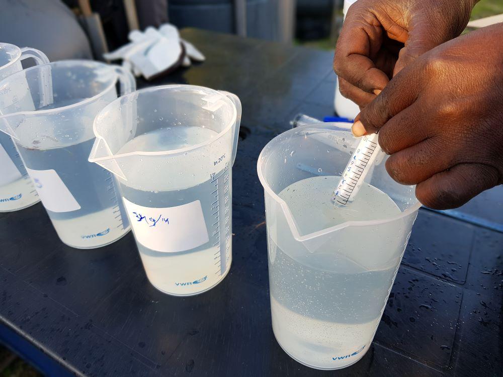 Measuring PH levels in water to ensure they are safe for consumption.
