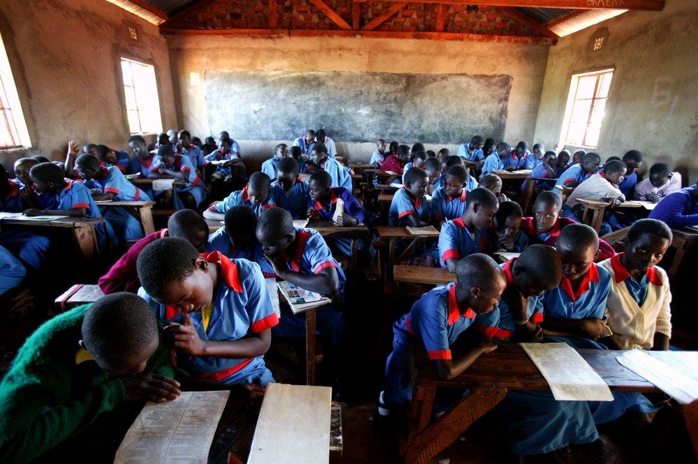 A picture of children in a class room in Kenya during a HIV/AIDS project in the main district hospital and nine rural health centres.  