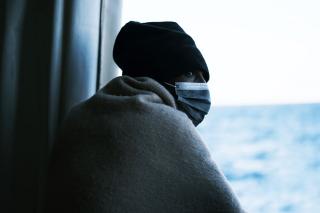 Moussa - 20 - Ivory Coast, poses for a photo on the Geo Barents, a rescue ship operated by Medecins Sans Frontieres. Rotation 8. Central Mediterranean Sea, March 10, 2022