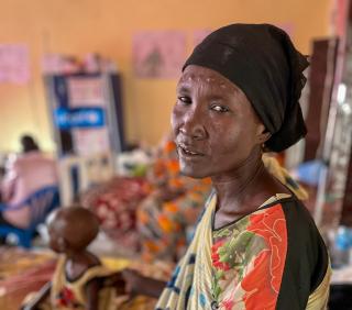 Sudan War &amp; South Sudan Refugees: Mary Okoth Yomon, 44 year-old, came to Renk Civil Hospital because her son Johmson Joseph suffers from malnutrition. She had seven children but three already died.