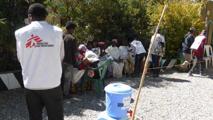 An MSF staff member does crowd control during a mobile clinic in Hawzen, northeast Tigray.