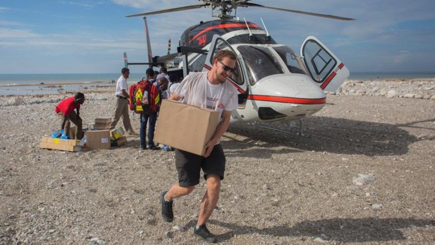 Msf-staff-member-carrying-supplies